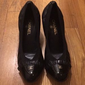 Black Chanel leather and patent leather pumps